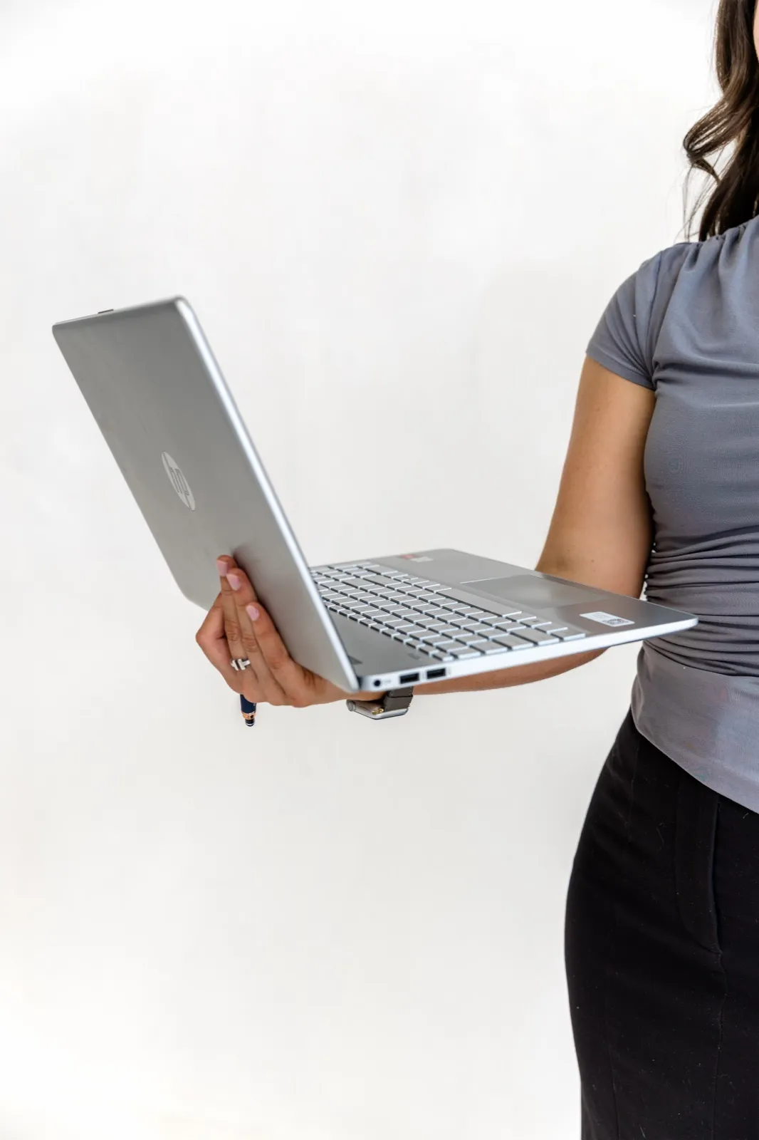 A member of the Bravo Accountants team working on a laptop